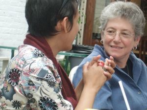 Dr. Helen Langa talks with Maria